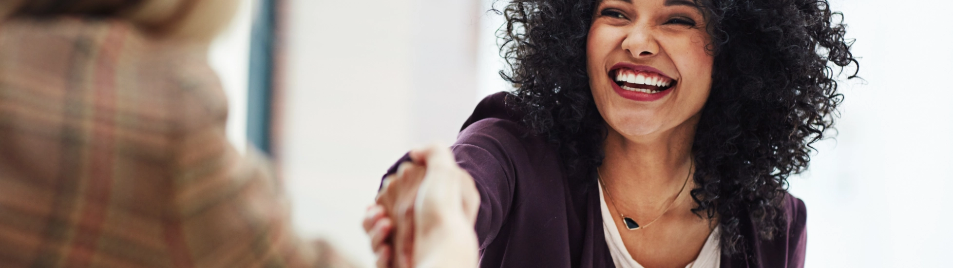 professional woman shaking hand